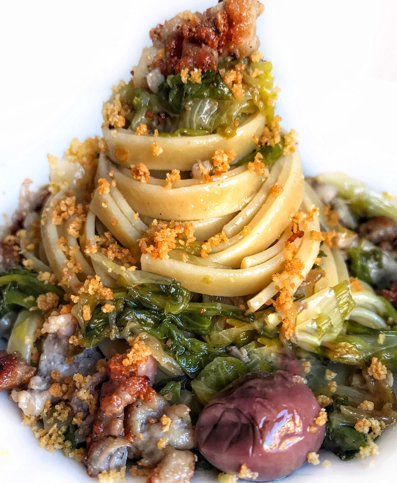 Fettuccia with escarole, sausage, black olives and muddica atturrata