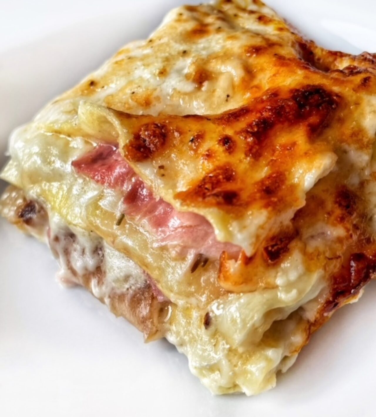 Lasagne con patate, provola affumicata e prosciutto cotto